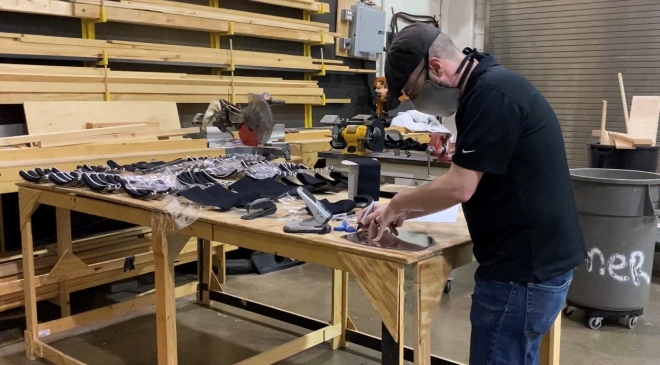 Weston Keifer, Technical Director, making face shields Weston Keifer, Technical Director, making face shields